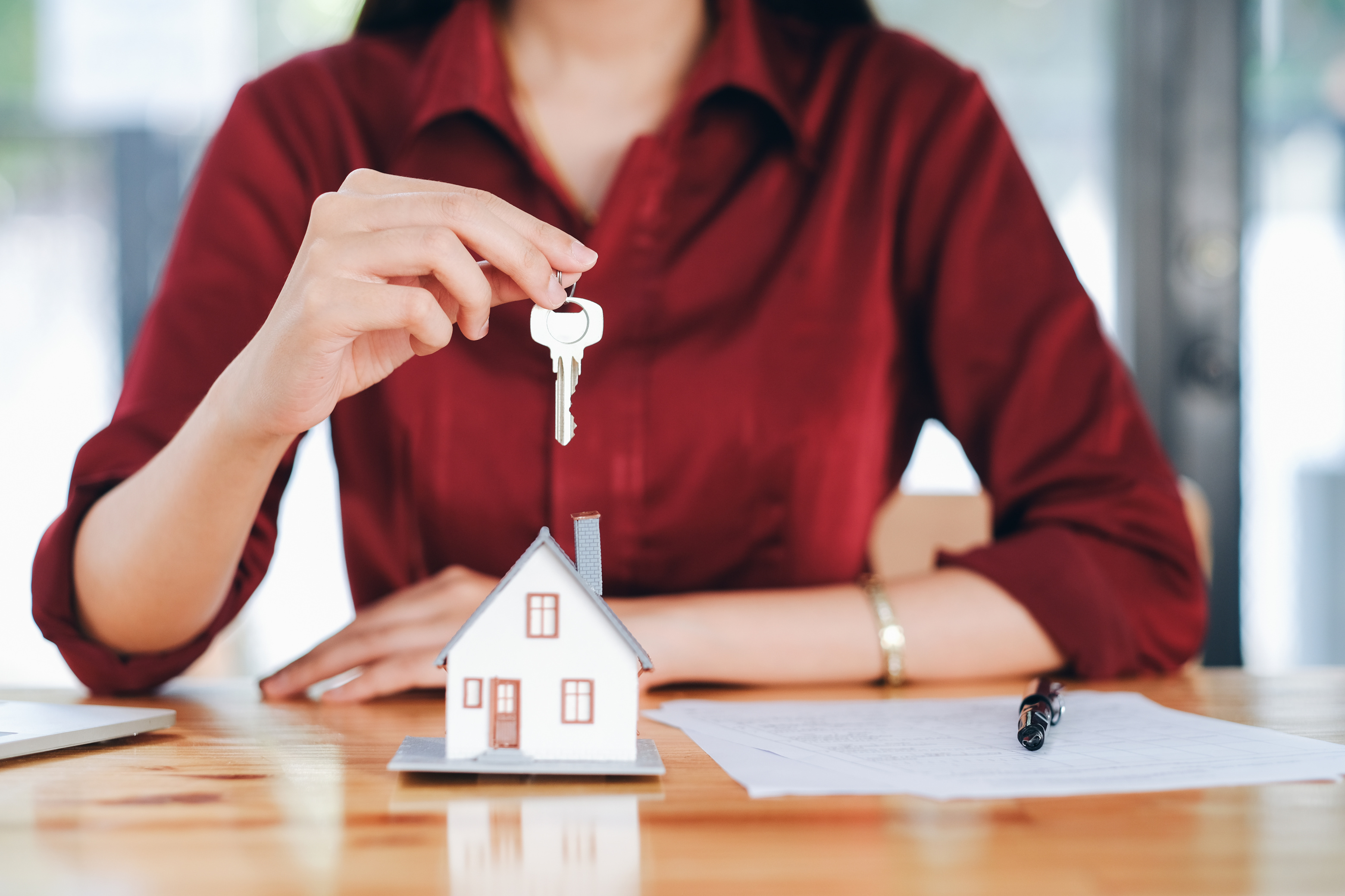 Real Estate Agent with House Keys
